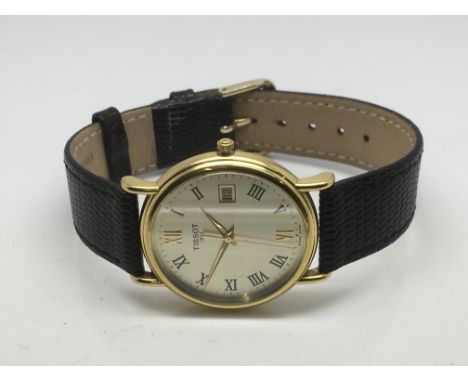 An 18ct gold cased gents Tissot watch.