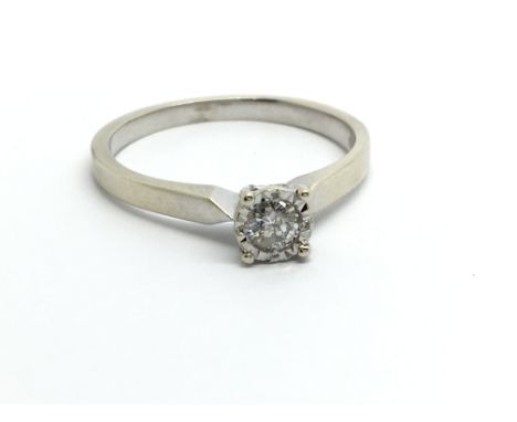 A 9ct white gold solitaire diamond ring, approx .15ct, approx 2.2g and approx size N-O.