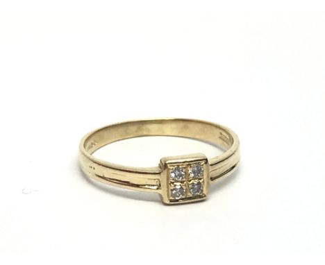 A 9ct gold ring set with four small diamonds, approx 1.7g and approx size J.