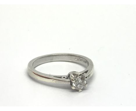 A 9ct white gold solitaire diamond ring, approx 1/4ct, approx 2.5g and approx size L.