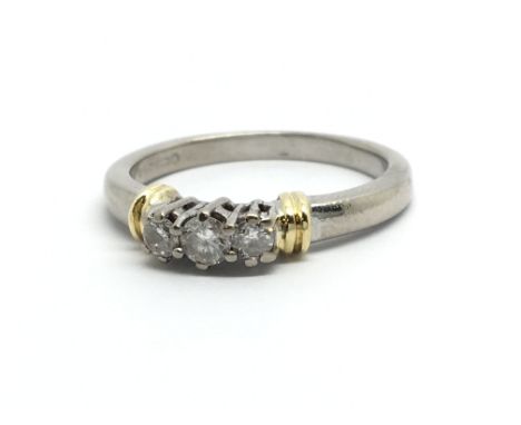 An 18ct gold three stone diamond ring, approx.15ct, approx 4.4g and approx size N.