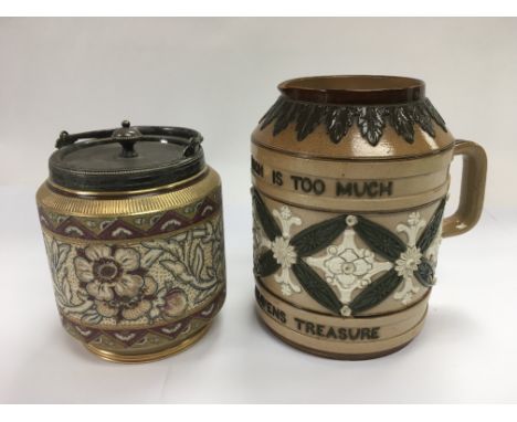A Doulton Lambeth jug and a ceramic biscuit barrel (2).