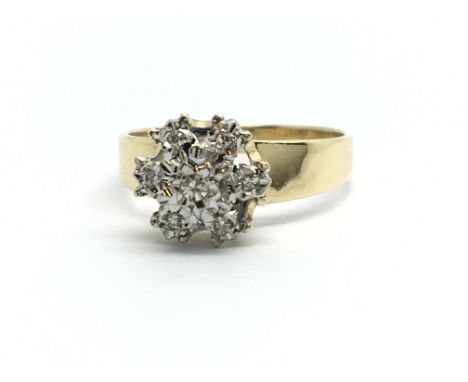 An 18ct gold diamond cluster ring, approx 2.7g and approx size I-J.