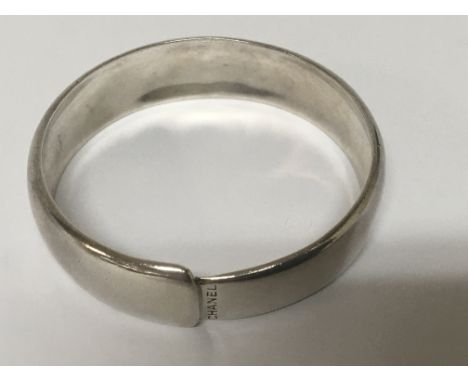 An Authentic Chanel silver bangle diameter 7cm.