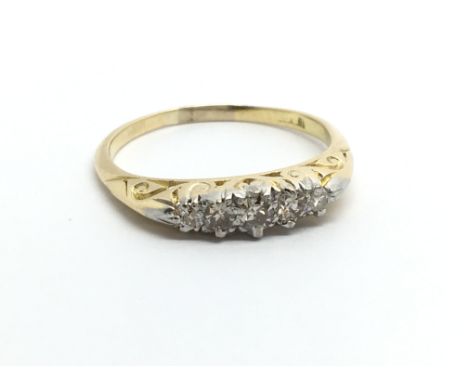 A vintage 18ct gold dive stone diamond ring, approx.25ct, approx 2.7g and approx size O.