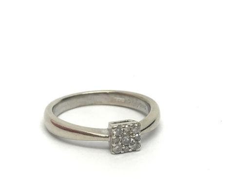 A 9ct white gold nine stone diamond ring, approx.15ct, approx 2.8g and approx size L-M.