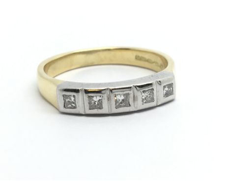 An 18ct gold diamond ring set with five princess cut diamonds, approx .20ct, approx 4.2g and approx size M.