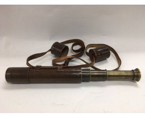 A circa 1900s leather cased telescope by Broadhurst Clarkson &amp; Co.