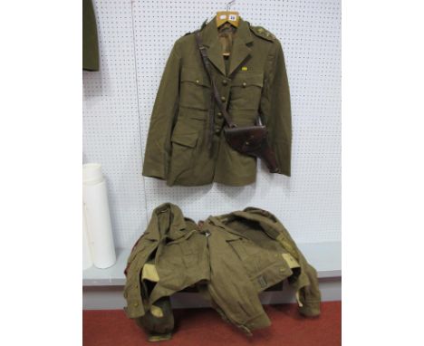 Two 1950's British Army Field Tunics, a No 2 tunic to The Rank of Captain, Royal Army Medical corps, plus a quantity of milit