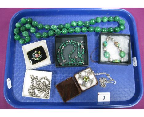 A Chunky Single Strand Polished Green Hardstone Bead Necklace, of uniform design, knotted, overall length approximately 72cm;