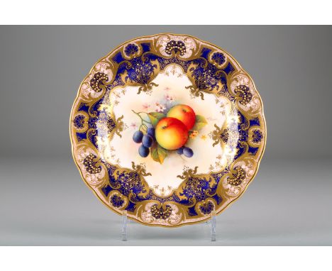 Pair Royal Worcester cabinet plates, hand painted with fruit by A Shuck. Date coded 1934. 23cm diameter 