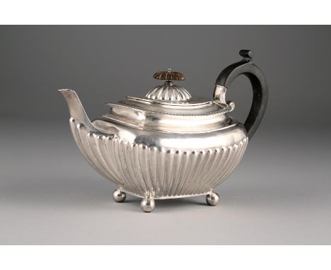 Late Victorian silver three piece tea service, fluted bodies, raised on spherical bun feet, Assay marked Sheffield 1899, appr