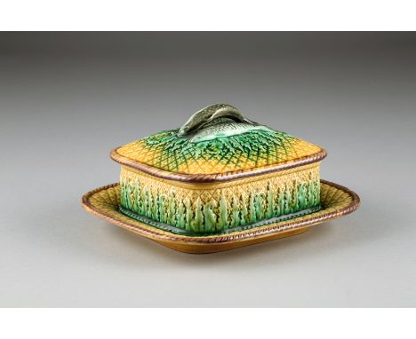 Majolica sardine dish and cover, probably Minton, purple interior, sardine finial to cover. 21cm long, 19cm wide, 11cm high 