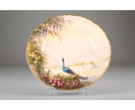 Royal Worcester cabinet plate, decorated with hand painted peacock in an Italian garden signed Sedgley, date coded 1924, 27cm