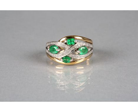 Ladies 9 carat white and yellow gold cross over ring with four mounted emeralds