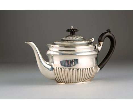 Edwardian silver three piece tea service, oval form with part fluted, Assay marked Sheffield 1904, approx. 32ozs 