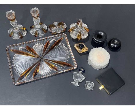 An amber glass dressing table set, top include tray (31 x 21cm) with starburst pattern, candlesticks etc, together with misce