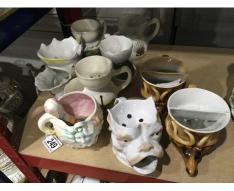 A collection of Continental and English porcelain shaving mugs, including Royal Bayreuth stag cups, Porzellanfabrik Moschendo