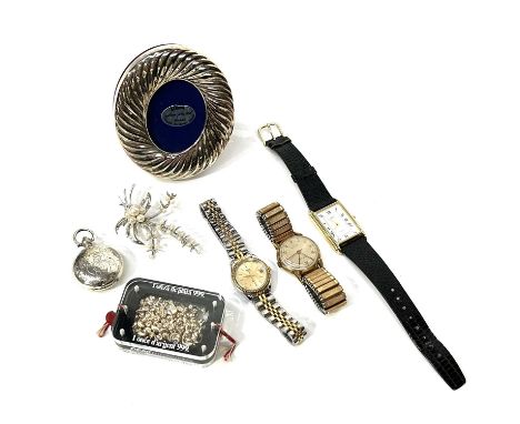 Watches and costume jewellery, including a silver sovereign case, Birmingham hallmarks, Timex, Tell, oval phot frame, 1 once 