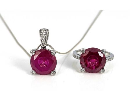 A 14k gold pendant and ring, each set synthetic ruby inset with three white stones, ring size N 1/2 (2)