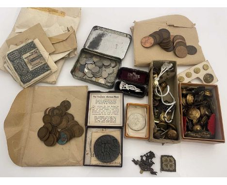 A collection of 20th century British military cap badges and buttons, including The West Riding, Artillery, an enameled badge