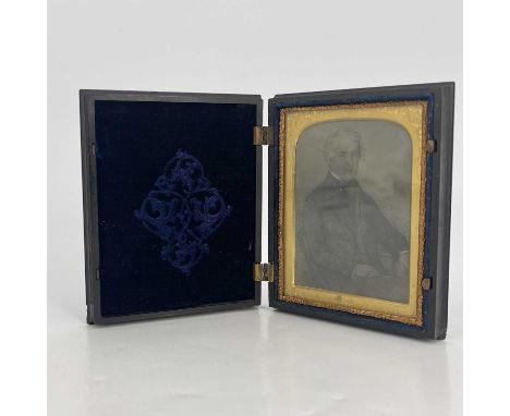A Union thermoplastic ambrotype case by Samuel Peck &amp; Co, circa 1858, moulded cover scene of Sir Roger de Coverley with t