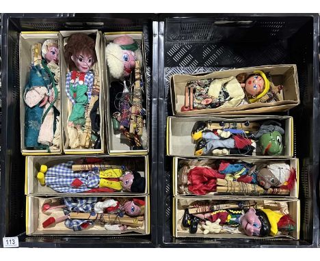 A collection of nine Pelham Puppets, including Pinocchio, Jiminy Cricket, Mitzi, Dutch Girl and Boy, Macboozle, Hanwell, Lady