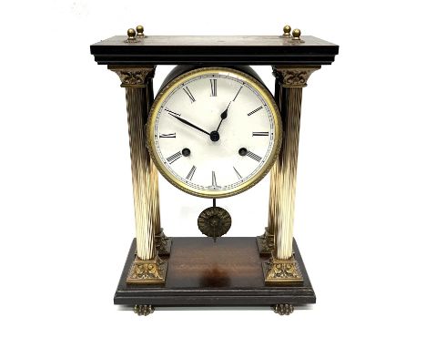 A French bracket clock, of architectural form with a colonnade of four Corinthian columns, 15cm circular painted dial with Ro