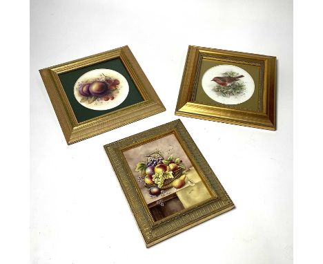 Bryan Cox (Royal Worcester Artist), three painted porcelain plaques, still life study of fruit basket, Robin amongst trailing
