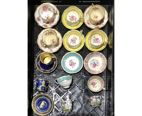 A quantity of English porcelain tea cups and saucers, including Paragon, Hammersley and Carlton and two Chinese coffee cans (