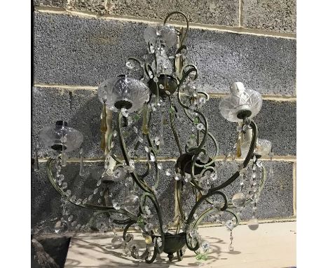 A French style six light metal chandelier, scrolling verdi gris frame with draped facet cut glass drops, approximately 70cm h
