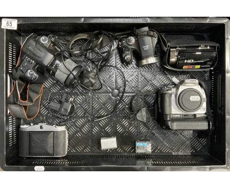 Camera equipment, including Canon Rebel XTI, fujifilm FinePix S5700, Sony A300, DVC Digital Video Camera and an Agfa Isolette