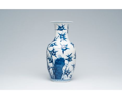 Title: A Chinese blue and white vase with bamboo all around, Kangxi mark, 19th C.Description:H 35,5 cm