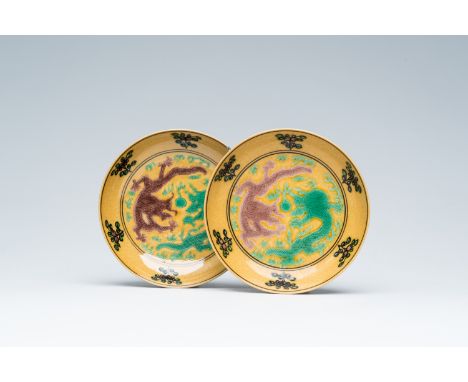 Full title: Two Chinese yellow ground green and aubergine glazed 'dragons chasing the pearl' saucers, Tongzhi and Guangxu mar