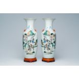 A pair of Chinese qianjiang cai vases with figures and a water buffalo in a landscape, 19th/20th C.