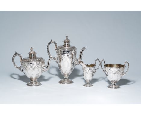 Full title: A four-piece English Victorian silver coffee and tea set with mascarons and garlands, maker's mark Edward Barnard