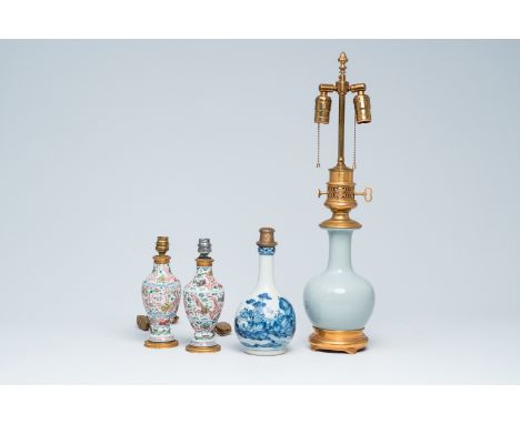 Full title: Four Chinese famille verte, blue, white and monochrome vases mounted into lamps, Kangxi and laterDescription:H 62