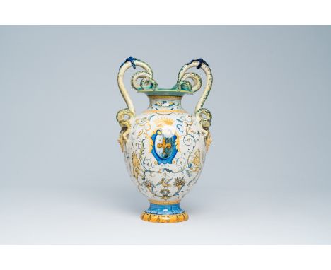 Full title: An Italian polychrome maiolica vase with mascarons and snake-shaped handles, Cantagalli, 19th C.Description:H 44,