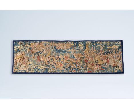 Full title: A fragment of a Flemish wall tapestry with a warrior scene after the antique, 17th C.Description:197 x 63 cm