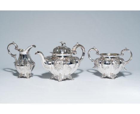 Full title: A three-piece English Victorian silver tea set with floral relief design, maker's mark Hayne and Carter, London, 