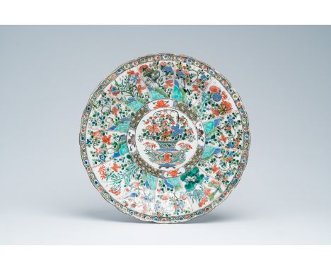 Full title: A Chinese famille verte charger with a flower basket and floral design, KangxiDescription:Dia.: 36,2 cm