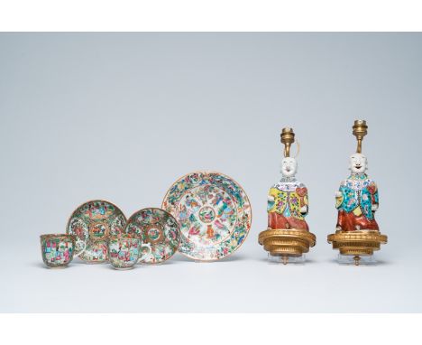 Title: A varied collection of Chinese Canton famille rose porcelain and two figures mounted as lamps, 19th C.Description:H 30