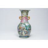 A large Chinese famille rose turquoise ground bottle vase with dragons and cartouches with animated