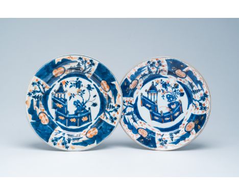 Full title: A pair of Chinese Imari style plates with landscapes and a palace garden, KangxiDescription:Dia.: 27,5 cm