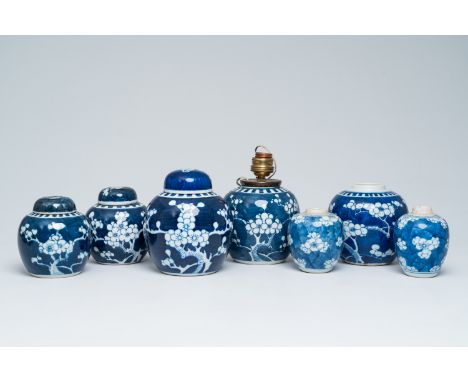 Full title: Seven Chinese blue and white prunus on cracked ice ground ginger jars, Kangxi and laterDescription:H 17,4 - 9,3 c