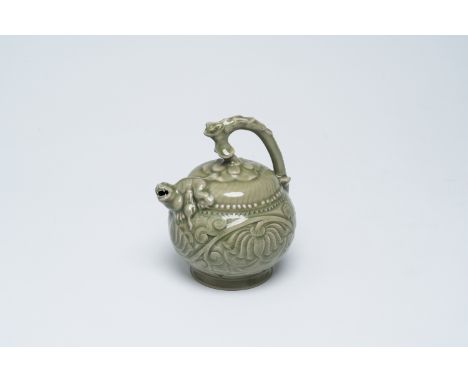 Full title: A Chinese celadon yaozhou style cadogan teapot with underglaze floral design, 20th C.Description:H 17,7 cm