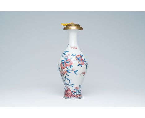 Full title: A Chinese blue, white and copper-red 'bats and peaches' vase mounted as a lamp, Kangxi mark, 19th/20th C.Descript