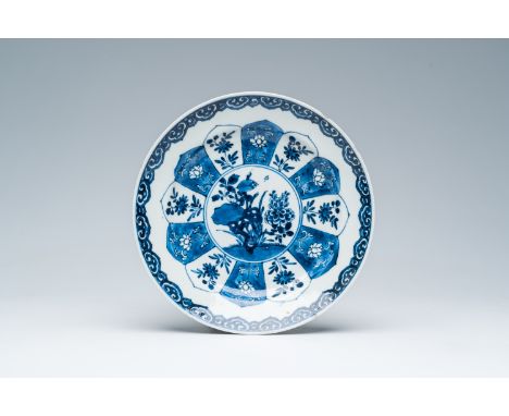 Full title: A Chinese blue and white plate with floral design, KangxiDescription:Dia.: 21 cm