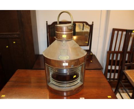 Large copper ships lantern bearing labels Seahorse GB 25541 and Babord