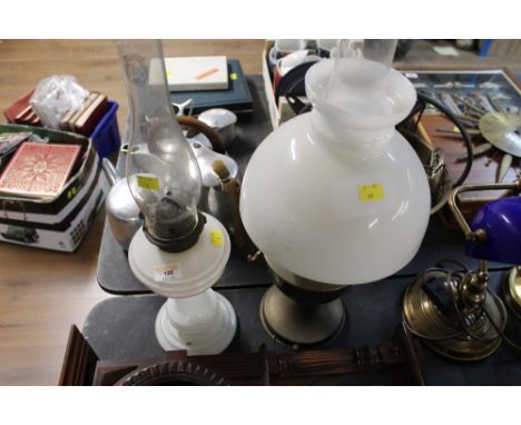 Victorian milk glass oil lamp and Victorian brass and glass oil lamp